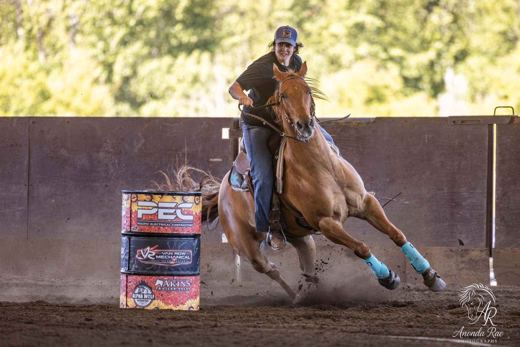 Kimmy Karlovich barrel racing, turning the first barrel
